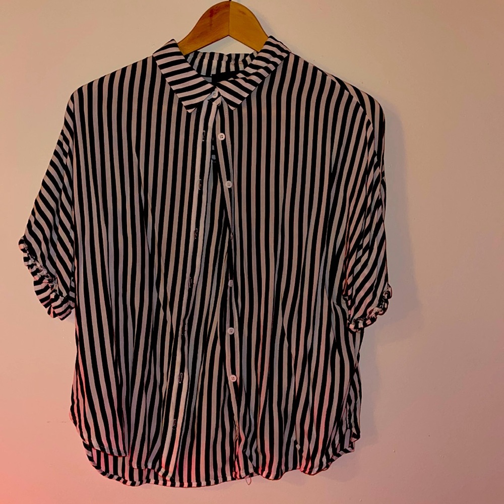 Dark grey and white stripped button down shirt.
